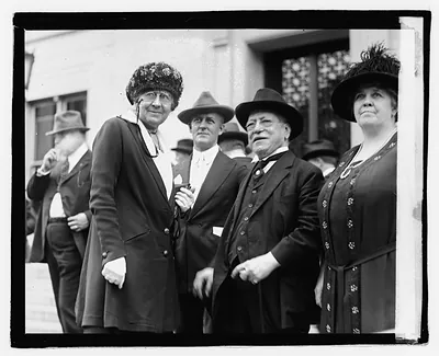 [Unidentified people outside office building]