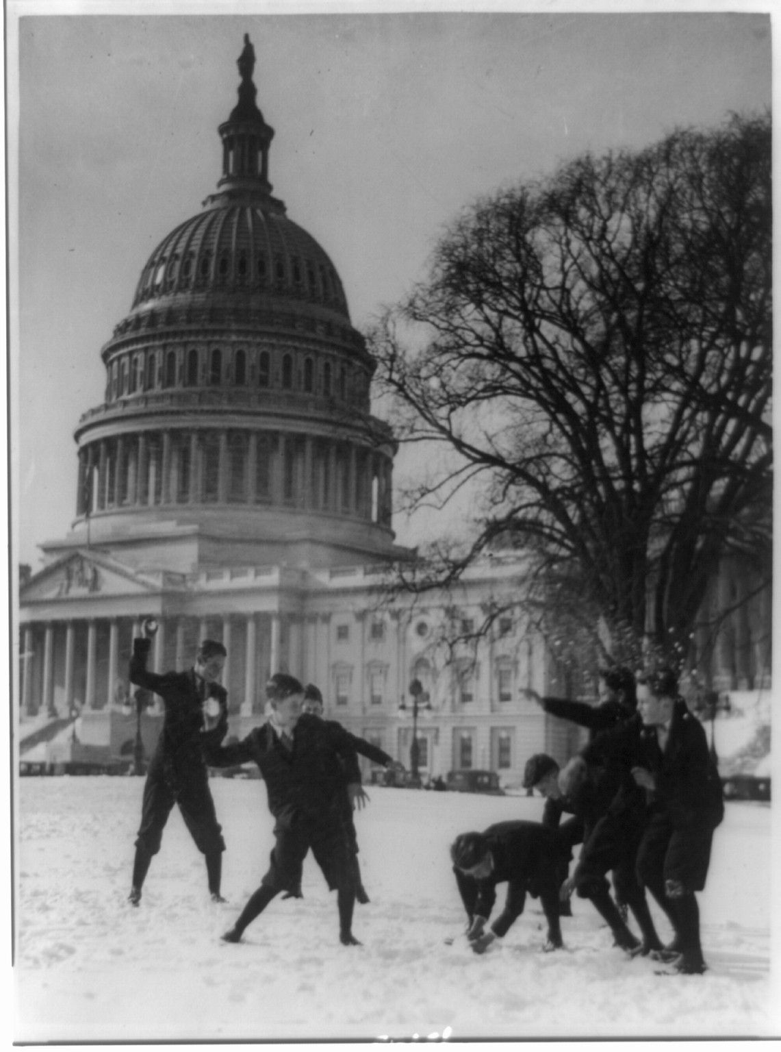 [Senate page boys stage their first snow battle on the Capitol plaza], [between 1909 and 1932] — historic photograph