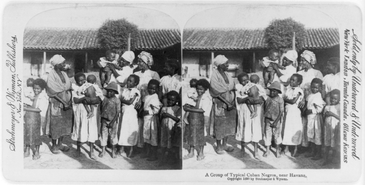 A group of typical Cuban Negros, near Havana, c1899. — historic photograph
