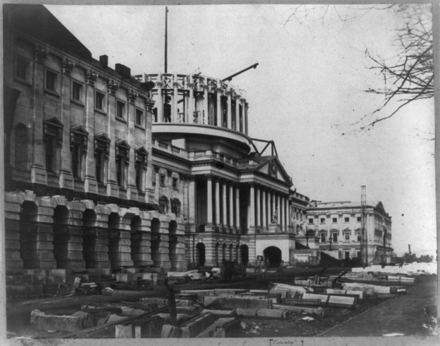 [Capitol construction, east front looking north, dome in progress], [1859] — historic photograph