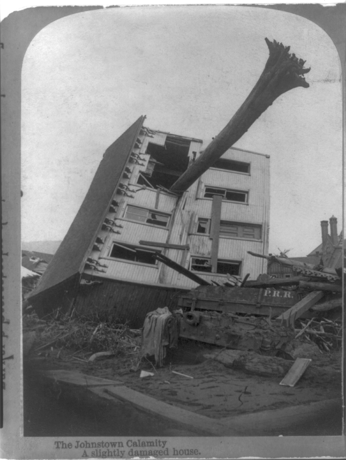 The Johnstown calamity. A slightly damaged house, [1889] — historic photograph