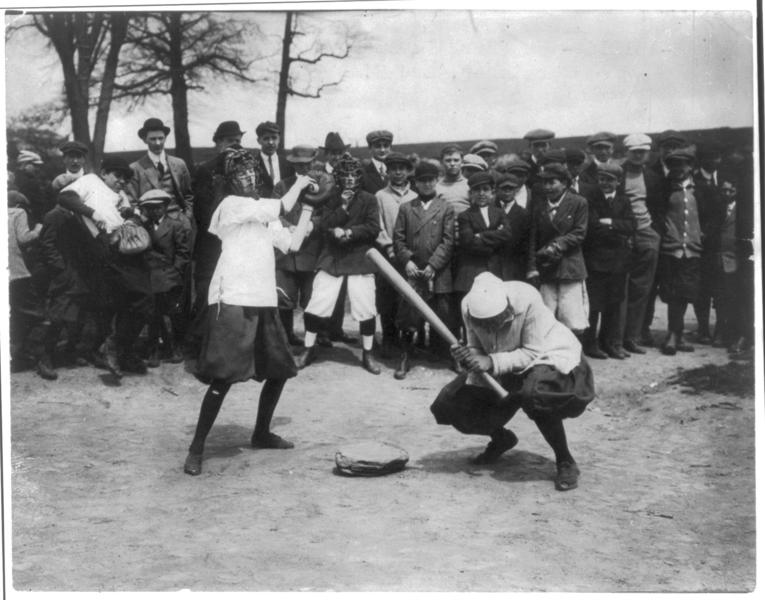New York female Giants" - Miss McCullum catcher and Miss Ryan at bat", c1913 July 11. — historic photograph