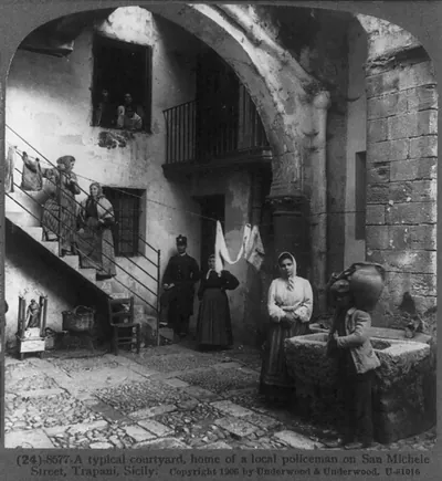 A typical courtyard, home of a local policeman on San Michele Street, Trapani, Sicily
