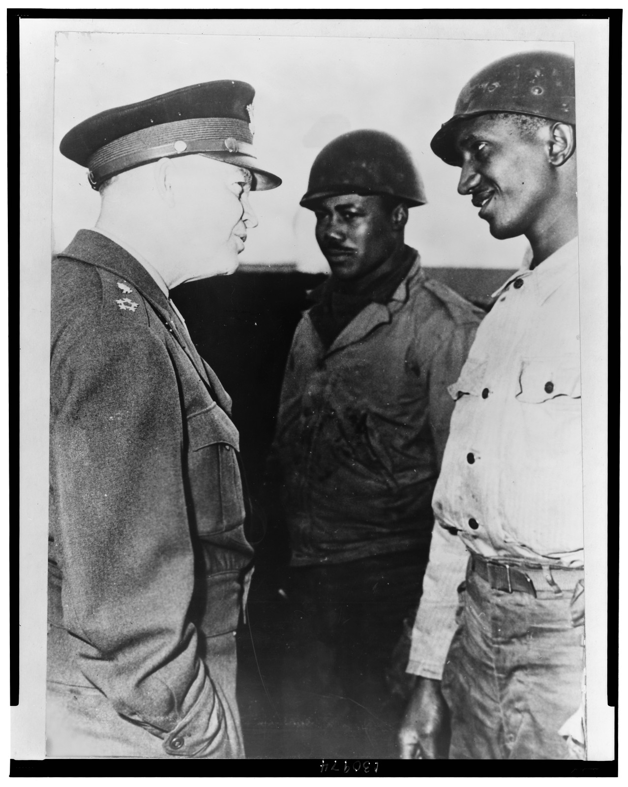 U.S. General Eisenhower visits supply port of Cherbourg, 1945 March 12. — historic photograph
