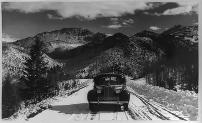 Packard automobile, Pikes Peak in early summer, Colorado Springs, Colorado