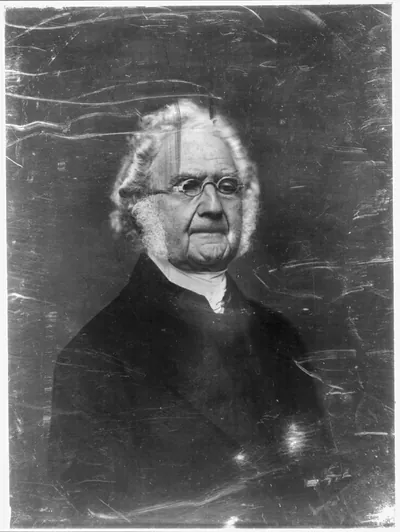 Elderly man with spectacles and white hair, portrait