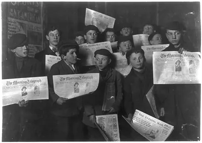 2 A.M. February 12,1908. Papers just out. Boys starting out on morning round. Ages 13 years and upward. At the side door of Journal Building near Brooklyn Bridge. New York, New York (State)