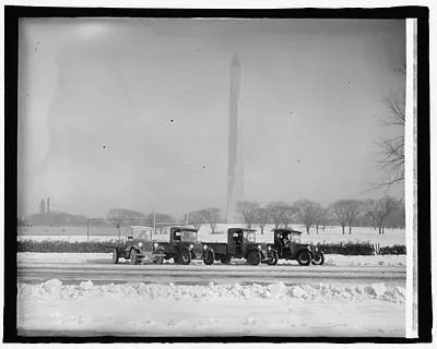 Graham Bros. Fussel trucks, [Washington Monument, Washington, D.C., in background]