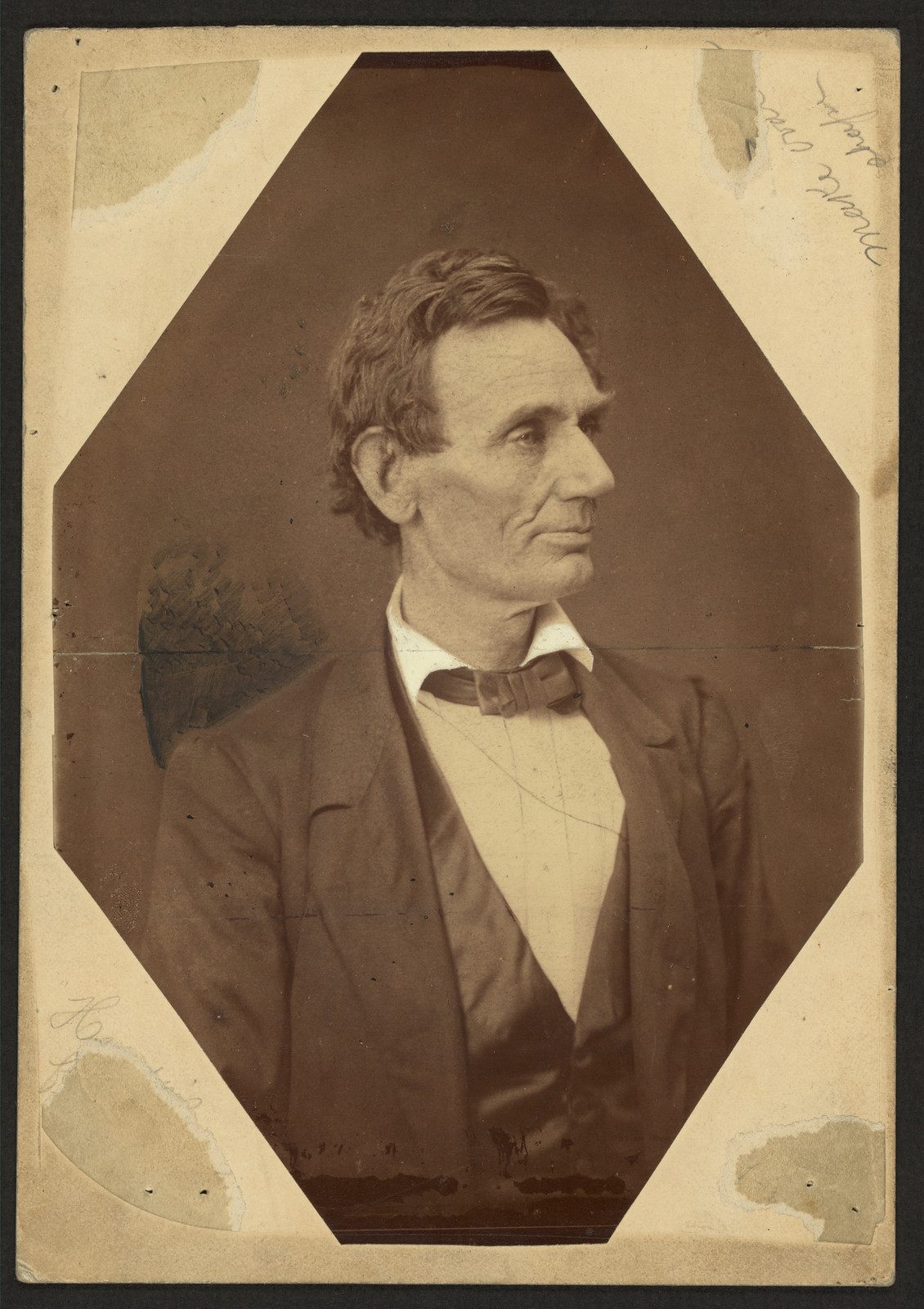 Sepia portrait of a man in profile, octagonal mount — historic image