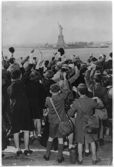 [The Statue of Liberty: British children sent to the U.S. for the war's duration hailing the statue as their ship enters New York Harbor]
