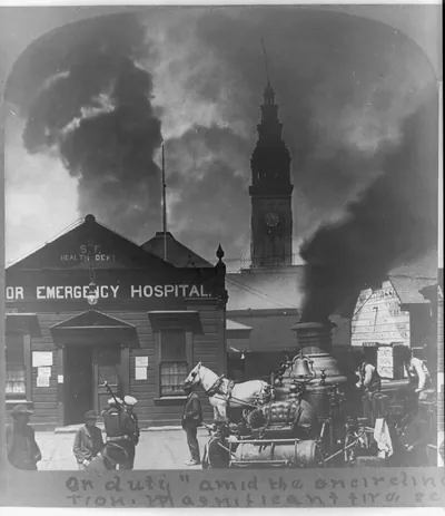 On duty amid the encircling gloom of a citys certain destruction. Magnificent fire scene near Union Ferry Bldg. San Francisco U.S.A.