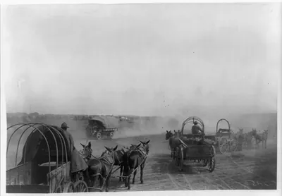 [U.S. Army Punitive Expedition after Villa, Colonia Dublan, Mexico, 1916. American Headquarters: Truck and 3 wagons in foregrd.]
