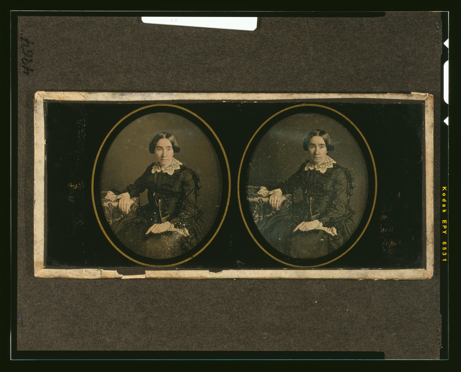 [Mrs. William Y. McAllister, half-length, seated, with arm resting on table with tablecloth], [between 1850 and 1860] — historic photograph