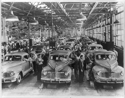 [Plymouth automobiles on assembly line]