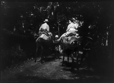 Man and woman on horseback, Japan