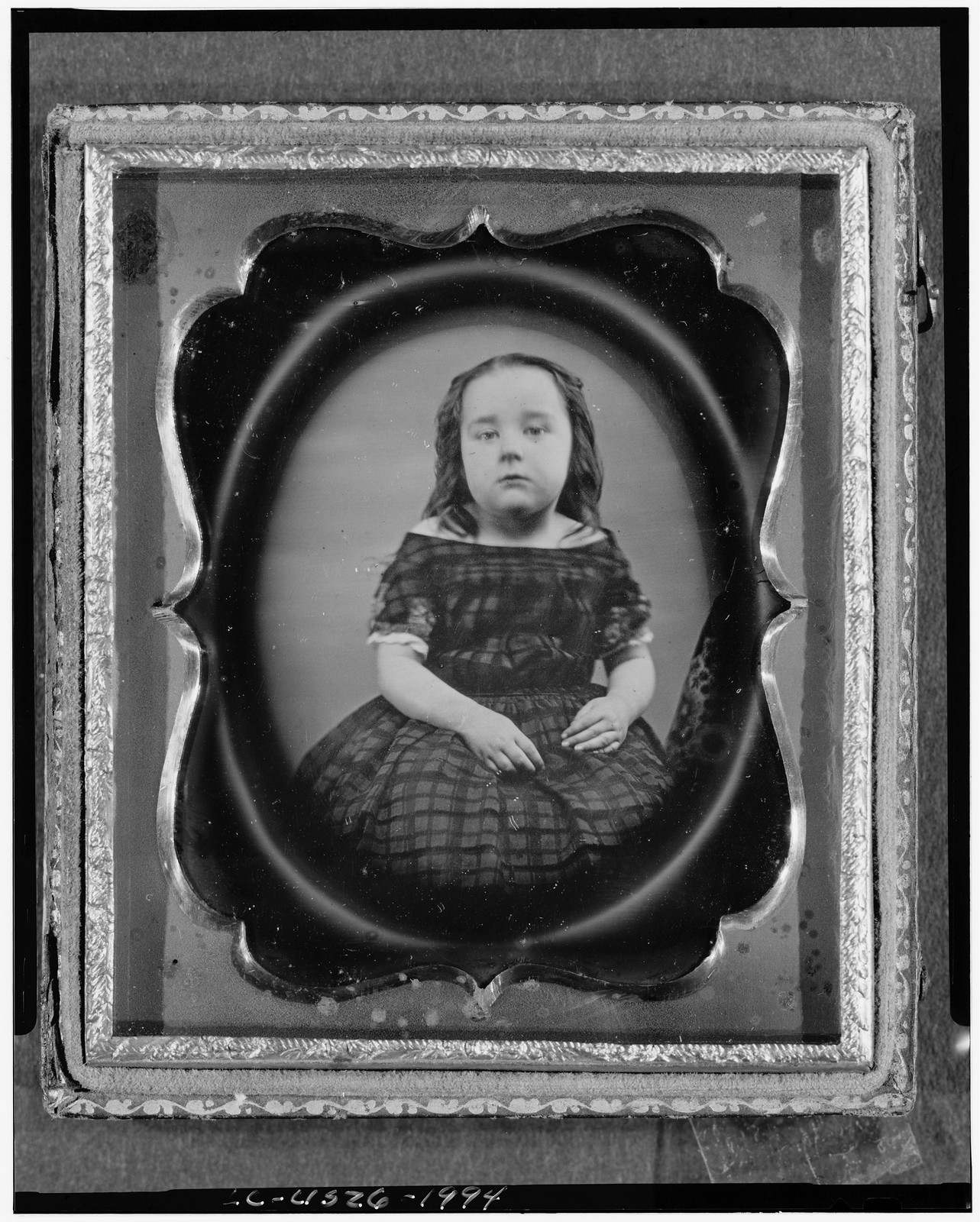 [Anne Dudley Roberts, three-quarter length portrait, facing front, as a girl], [between 1840 and 1860] — historic photograph