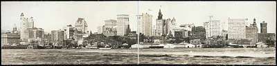 Panoramic photograph of a city skyline along the waterfront