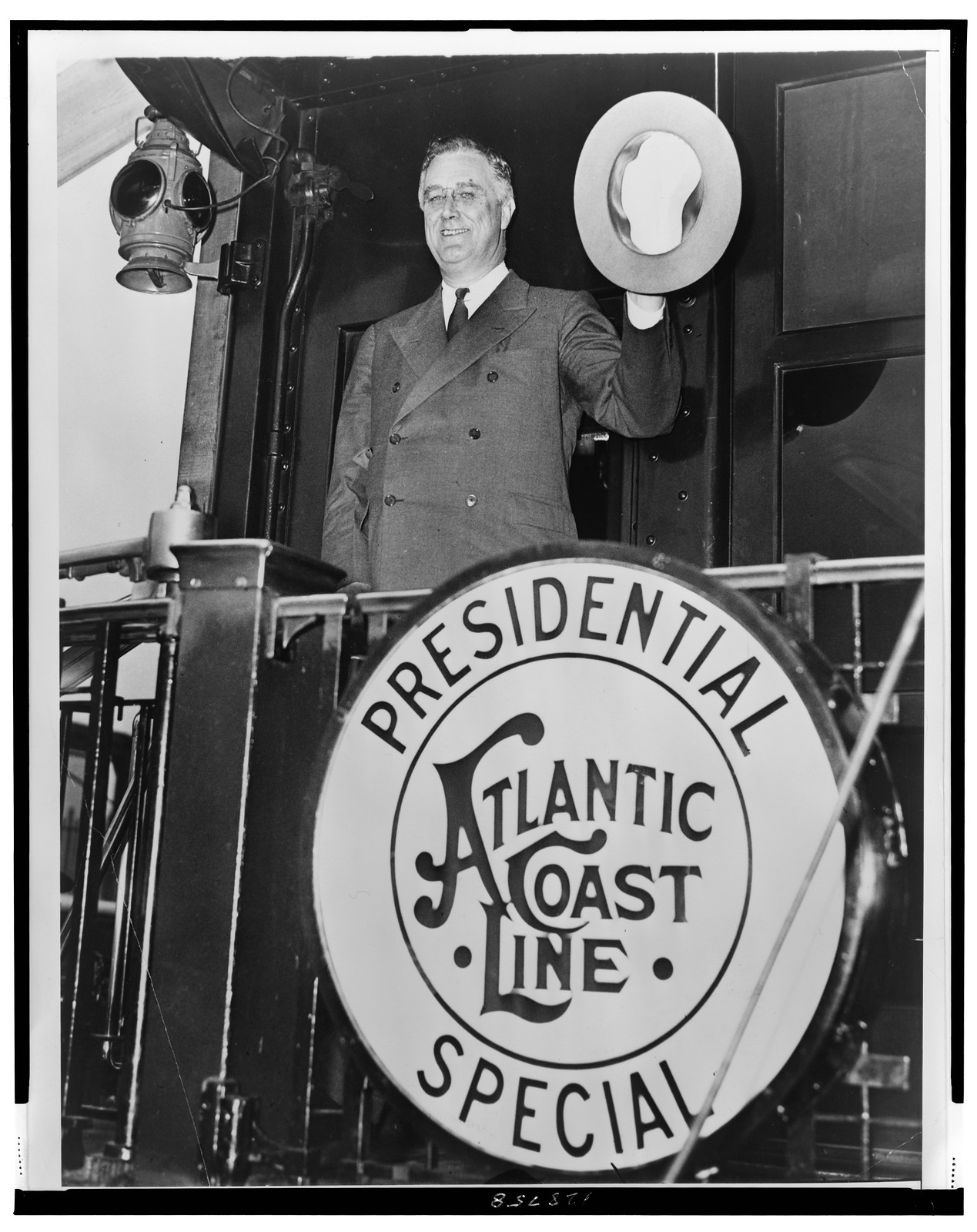 [President Franklin D. Roosevelt, leaving Washington, D.C. for Florida, waving goodbye from the rear of the Atlantic Coast Line Presidential Special Railroad] — historic photograph