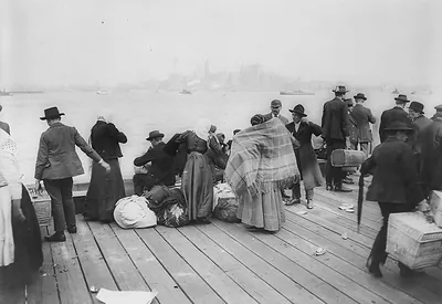 Immigrants waiting to be transferred, Ellis Island, October 30, 1912