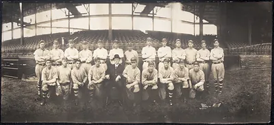 Baseball team posed in a stadium, panoramic photograph