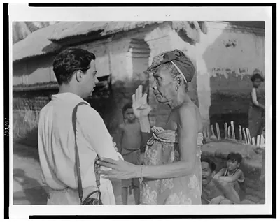 [Miguel Covarrubias talking to an elderly Balinese woman]