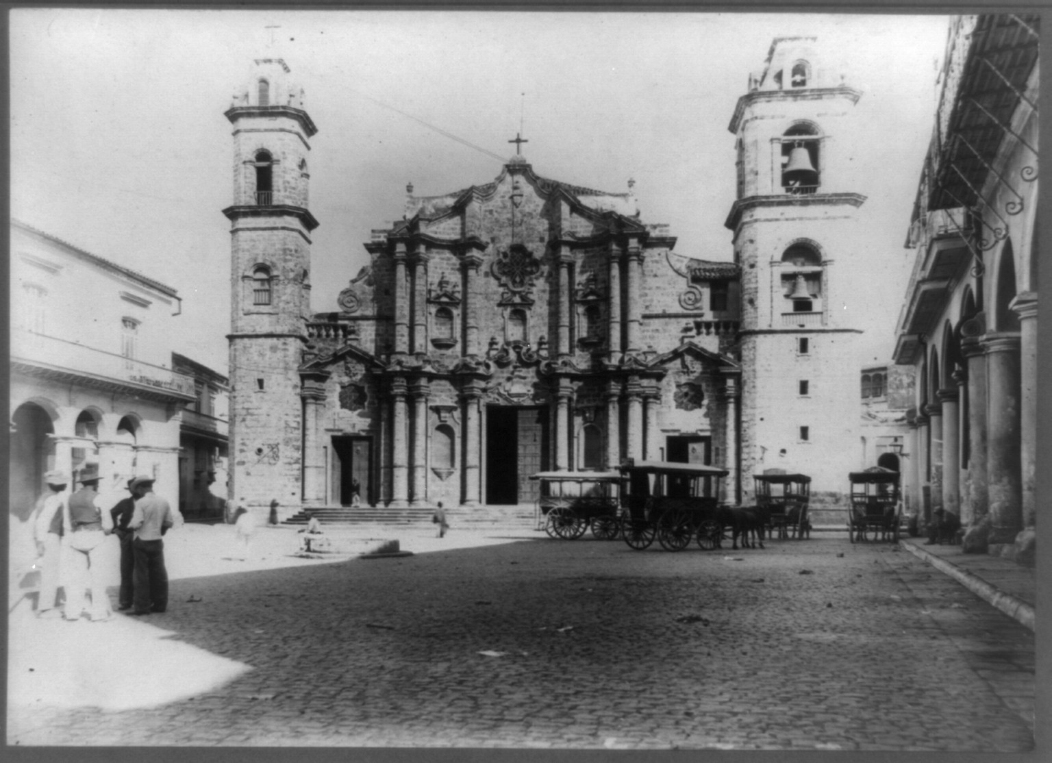 [Columbus Cathedral, Havana, Cuba, with horse-drawn wagons and group of men outside], [189-?] — historic photograph