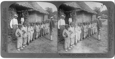 Boy soldiers in the regular Panama Army - contrasted with U.S. officers - part of a frontier guard, Bayano River