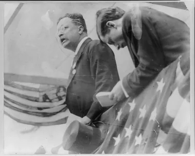 [Theodore Roosevelt, half, facing left, speaking at the Battery, N.Y.]