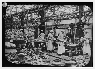 Engl. women in brass fitting shop
