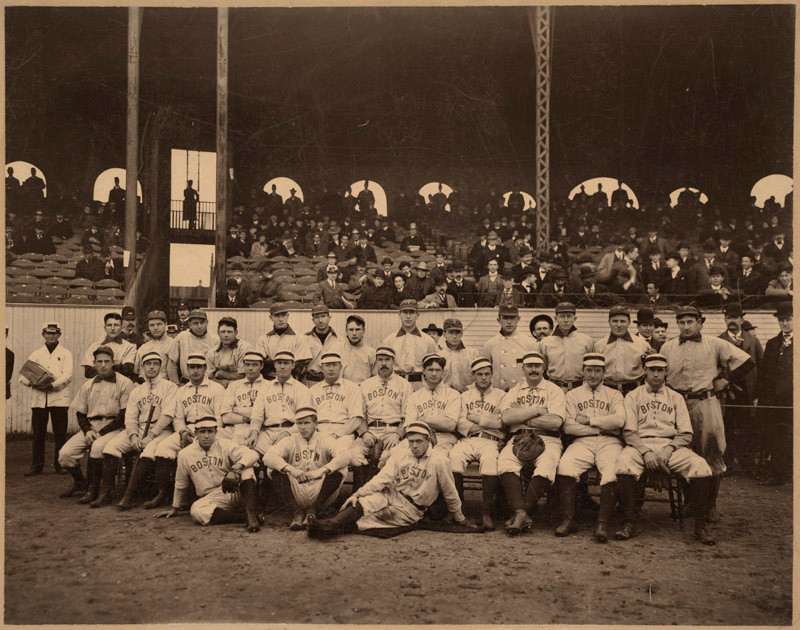 Boston baseball team posing before a grandstand crowd — historic image