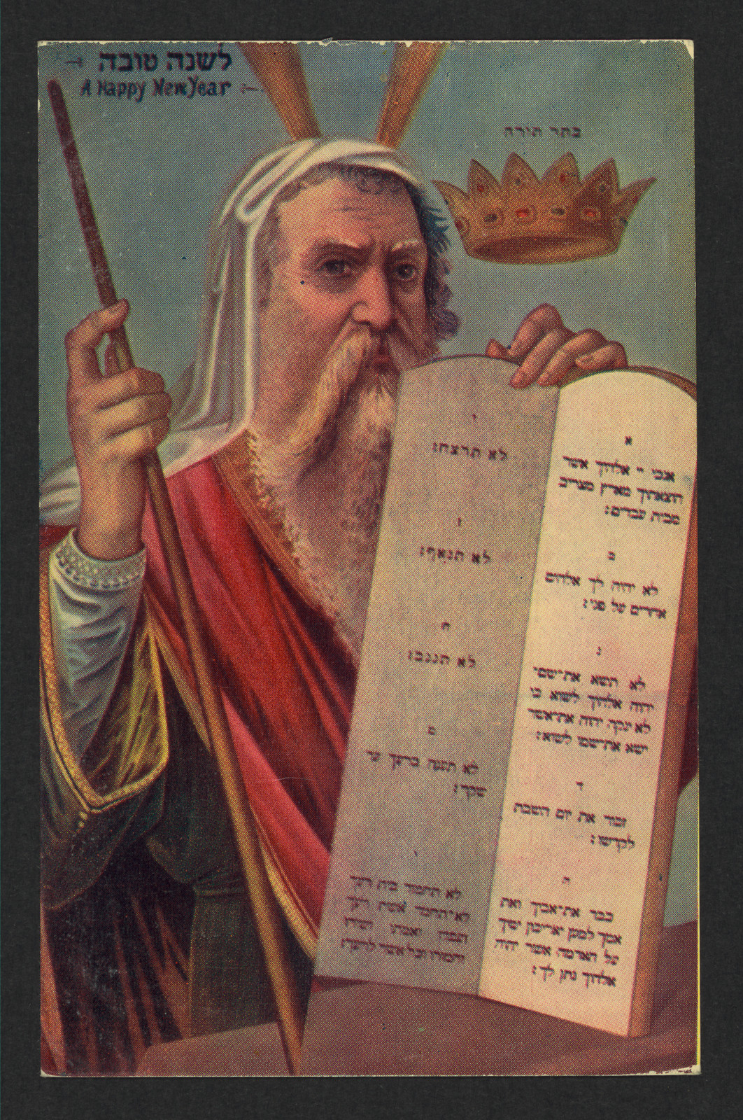 A Happy New Year postcard showing Moses holding the Ten Commandments tablets — vintage postcard