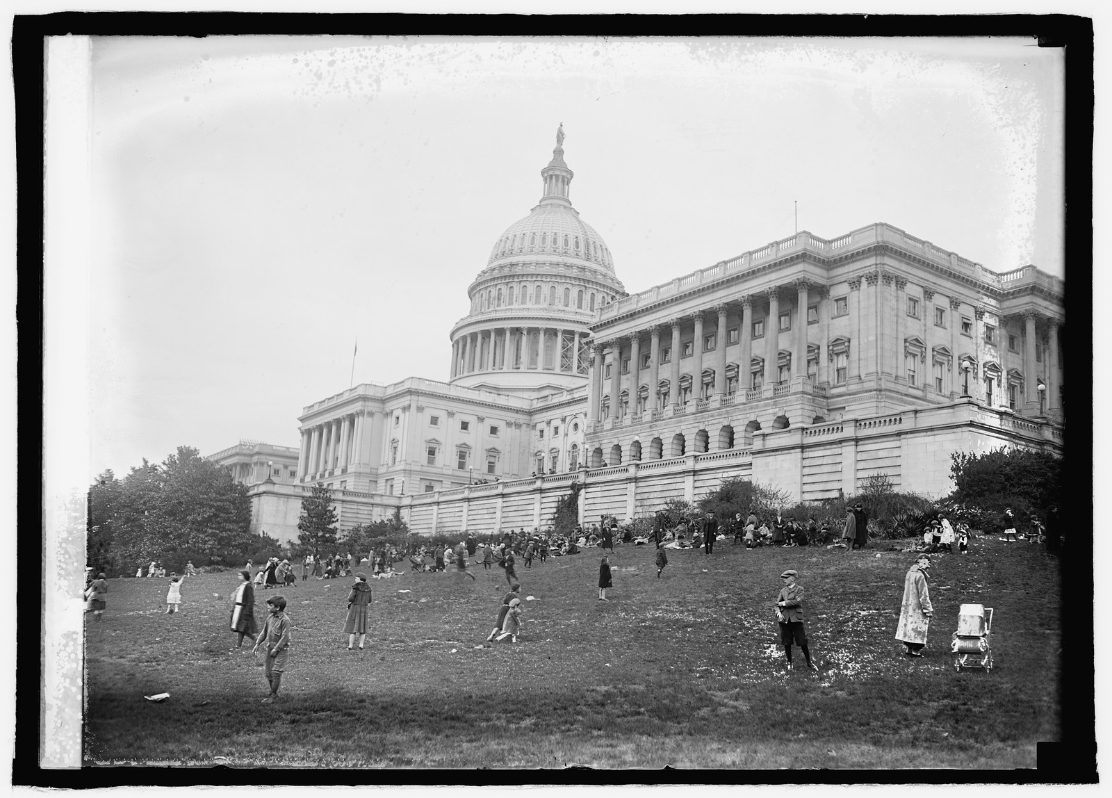 People on the Capitol lawn, historic black-and-white photograph — historic photograph