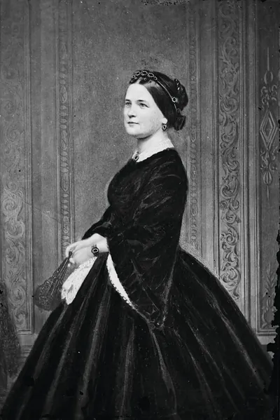 Portrait of a woman in a dark velvet dress