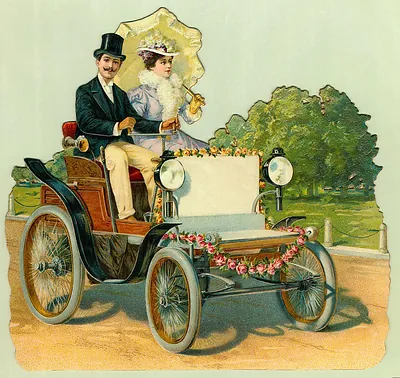 Couple in a flower-decorated vintage open automobile