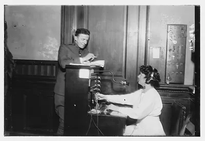 Unidentified man with telephone operator