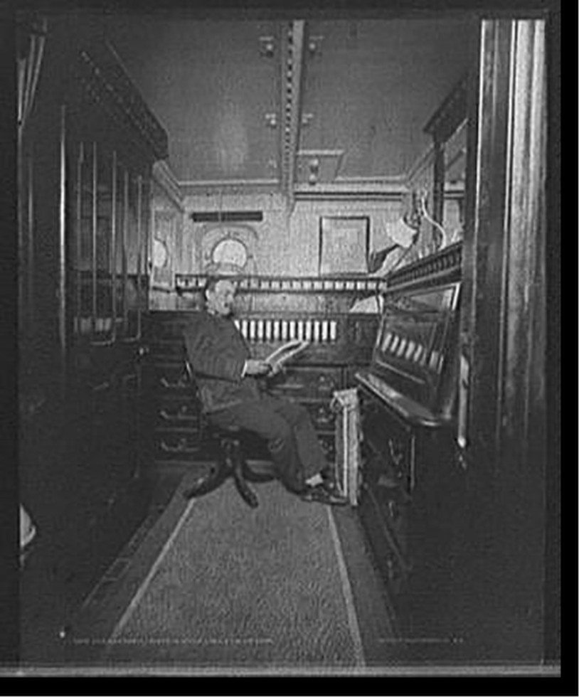 U.S.S. Cincinnati, Executive Officer Kelley in his room, [between 1890 and 1901] — historic photograph