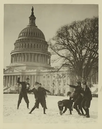 Senate Page Boys Stage Their First Snow Battle on the Capitol Plaza [c. 1909–1932].(photographic print, gelatin silver)