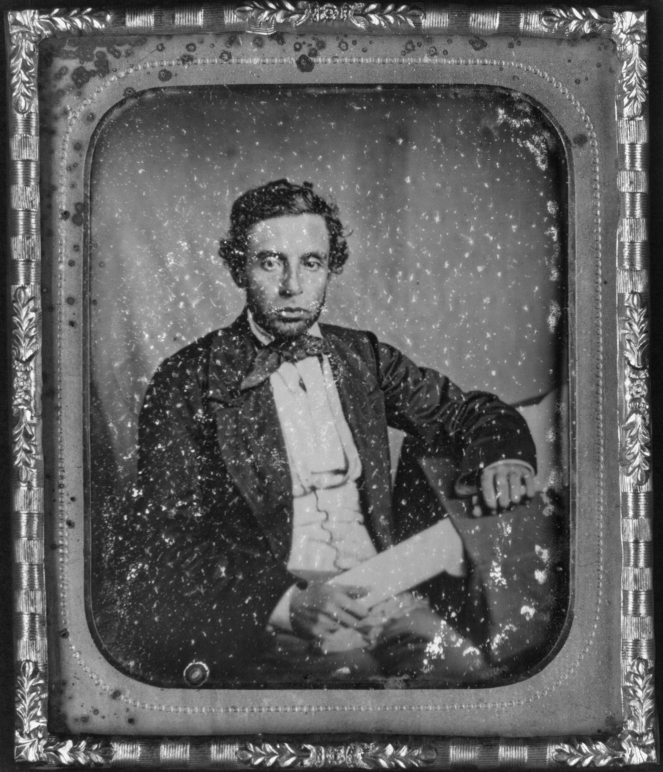 [Alfred Francis Russell, three-quarter length portrait, full face, seated at desk], [between 1856 and 1860] — historic photograph