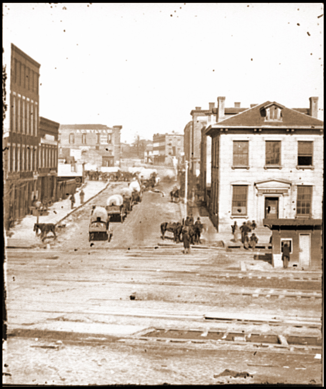 Atlanta Ga. Northward view across the tracks on Whitehall Street with wagon train, 1864 — historic photograph