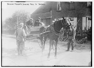 Belgian Peasants showing pass to sentries