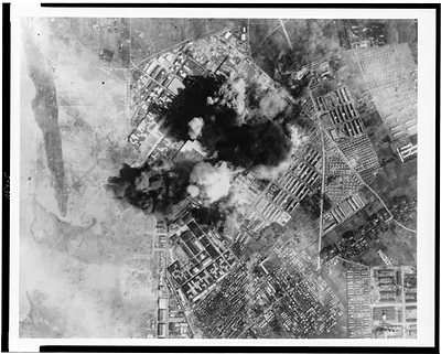 [Aerial view of bombing of Tachikawa Aircraft Co., Tackikawa, Japan]