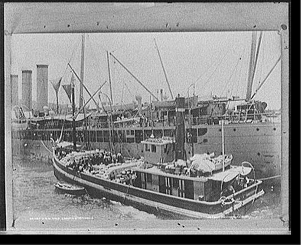 U.S.S. Yale, loading stores, [between 1890 and 1901] — historic photograph