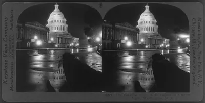 The dazzling dome of the Capitol on a rainy night, Washington, D.C.
