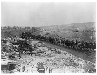 [Ammunition train passing artillery battery, France]