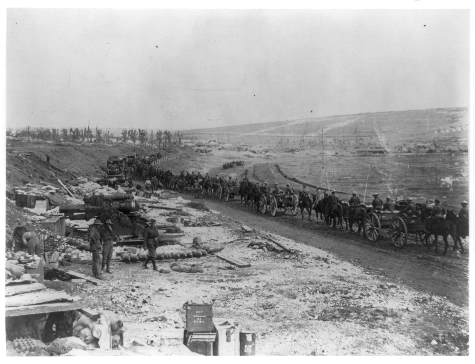 [Ammunition train passing artillery battery, France] — historic photograph