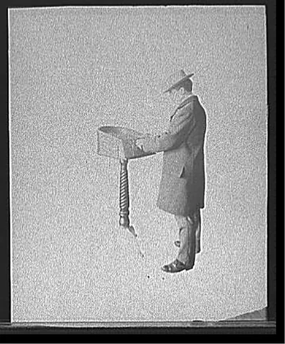 [The Caille-Schiemer Co. bagatelle machine in use]