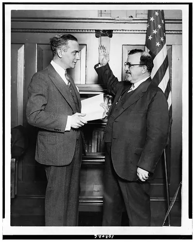 [John A. Kingsbury being sworn in as member of Advisory Health Council by Hon. Shirley Wynne, M.D., Commissioner of Health, New York City