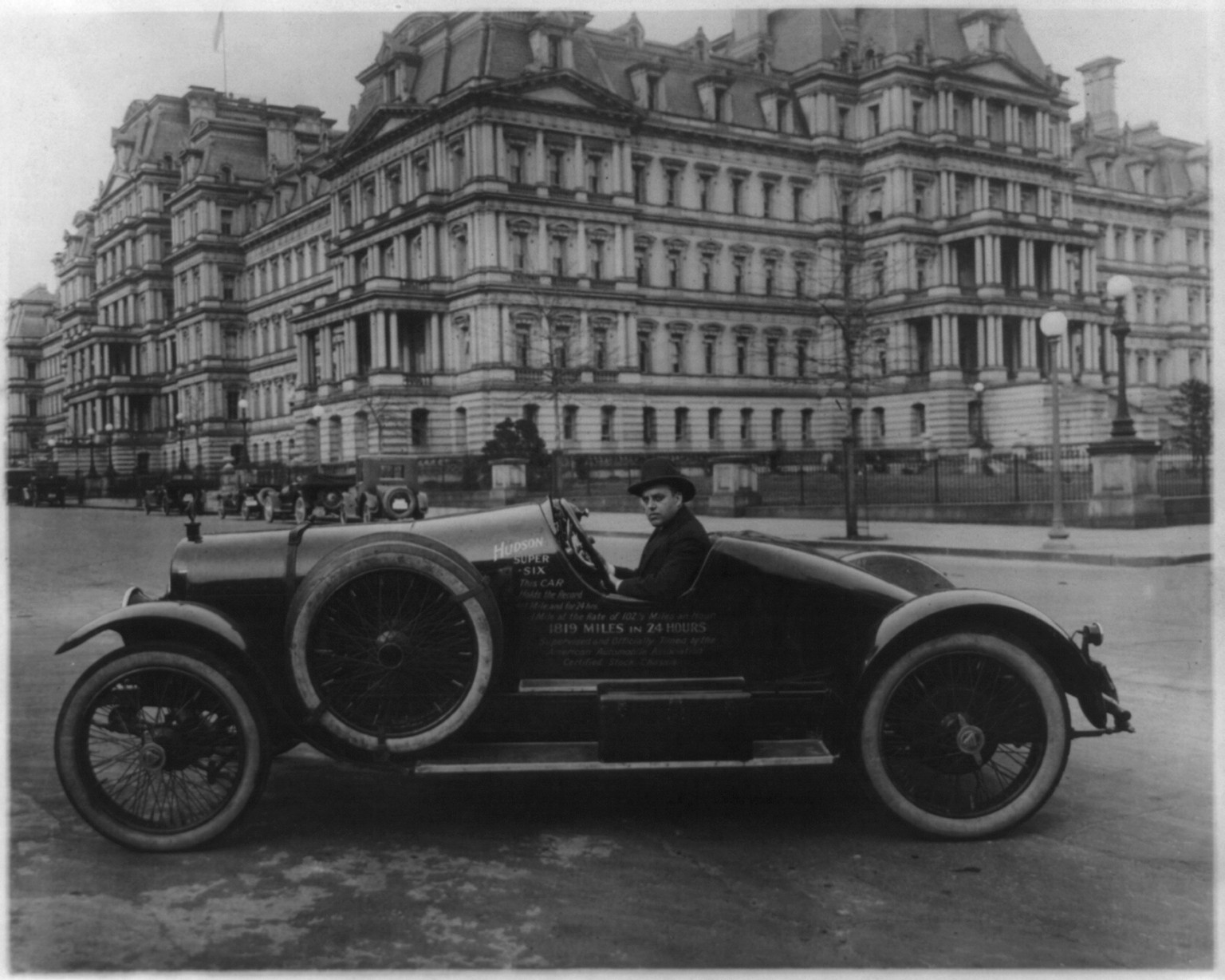 Hudson super six automobile in Washington, D.C., at 17th and Pennsylvania Avenues, N.W., in front of State, War, and Navy Bldg., [ca. 1920] — historic photograph