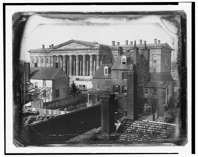 [United States Patent Office, Washington, D.C., showing F Street facade, possibly taken from the upper floor of the General Post Office]