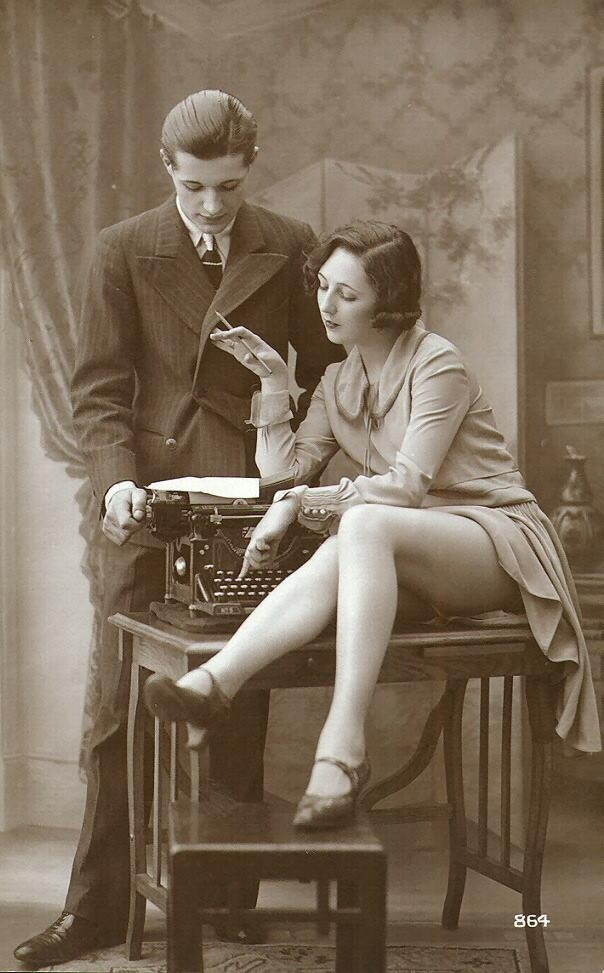Young couple with typewriter, sepia vintage photograph postcard — historic photograph